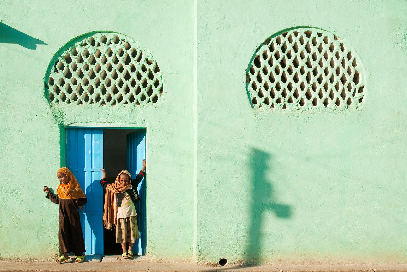 3c09b320_Muslim girls outside mosque in harar – dreamstime_xxl_24601948